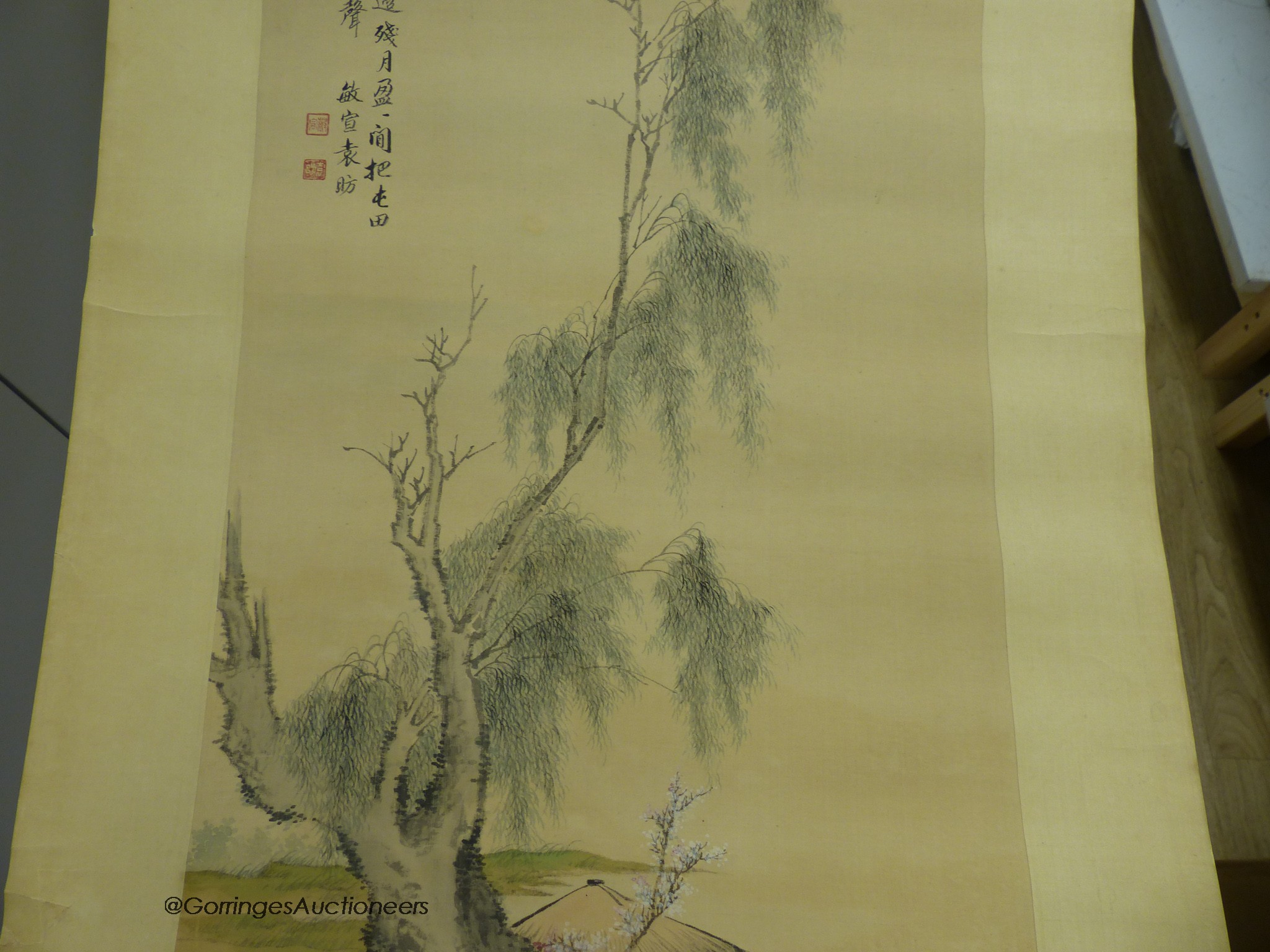 Two late 19th century Chinese scroll paintings, sage in a landscape and buildings in a landscape